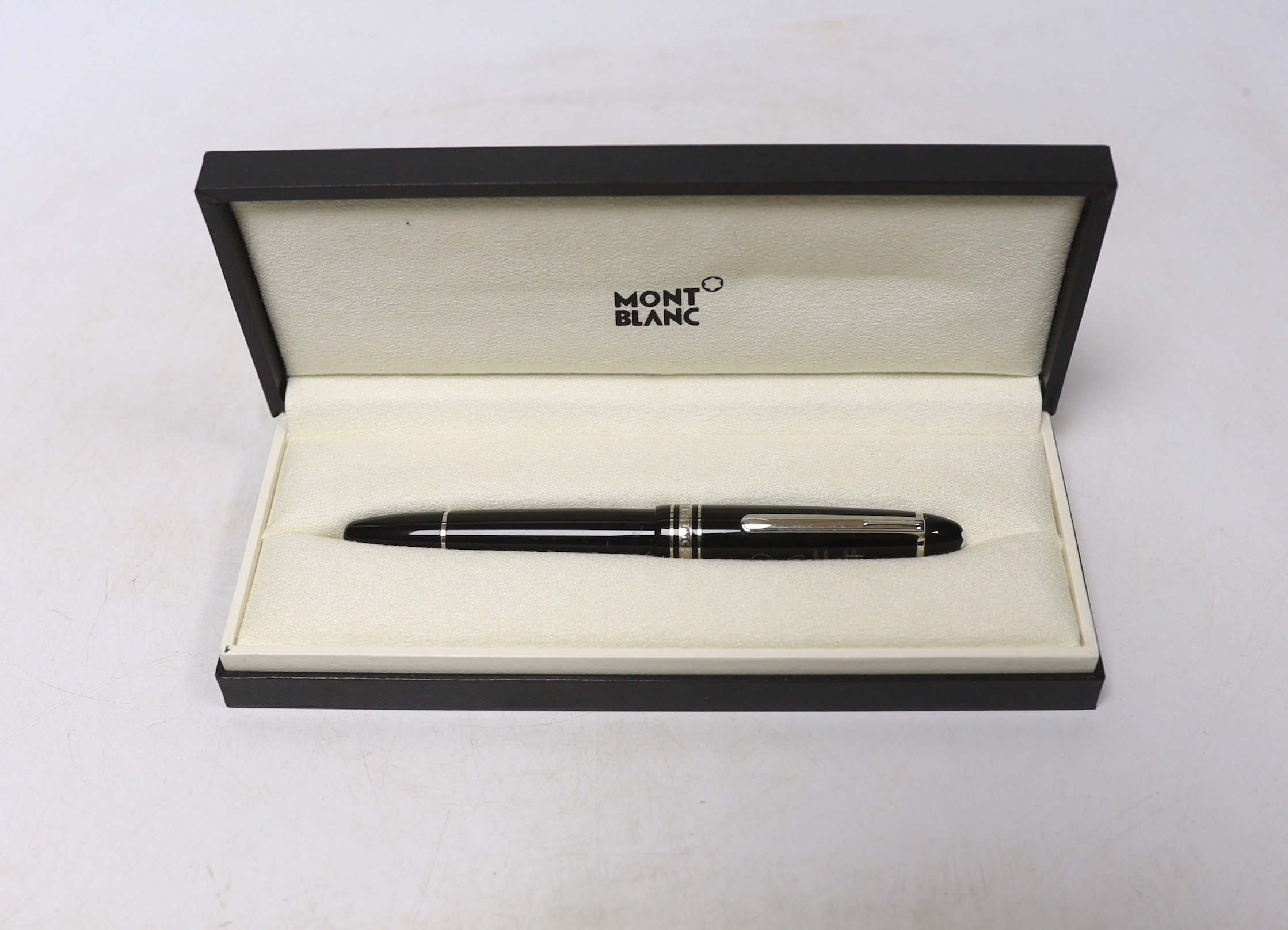 A Montblanc boxed ‘Meistertuck’ fountain pen and a leather cased Montblanc ballpoint pen, a spare box, etc.